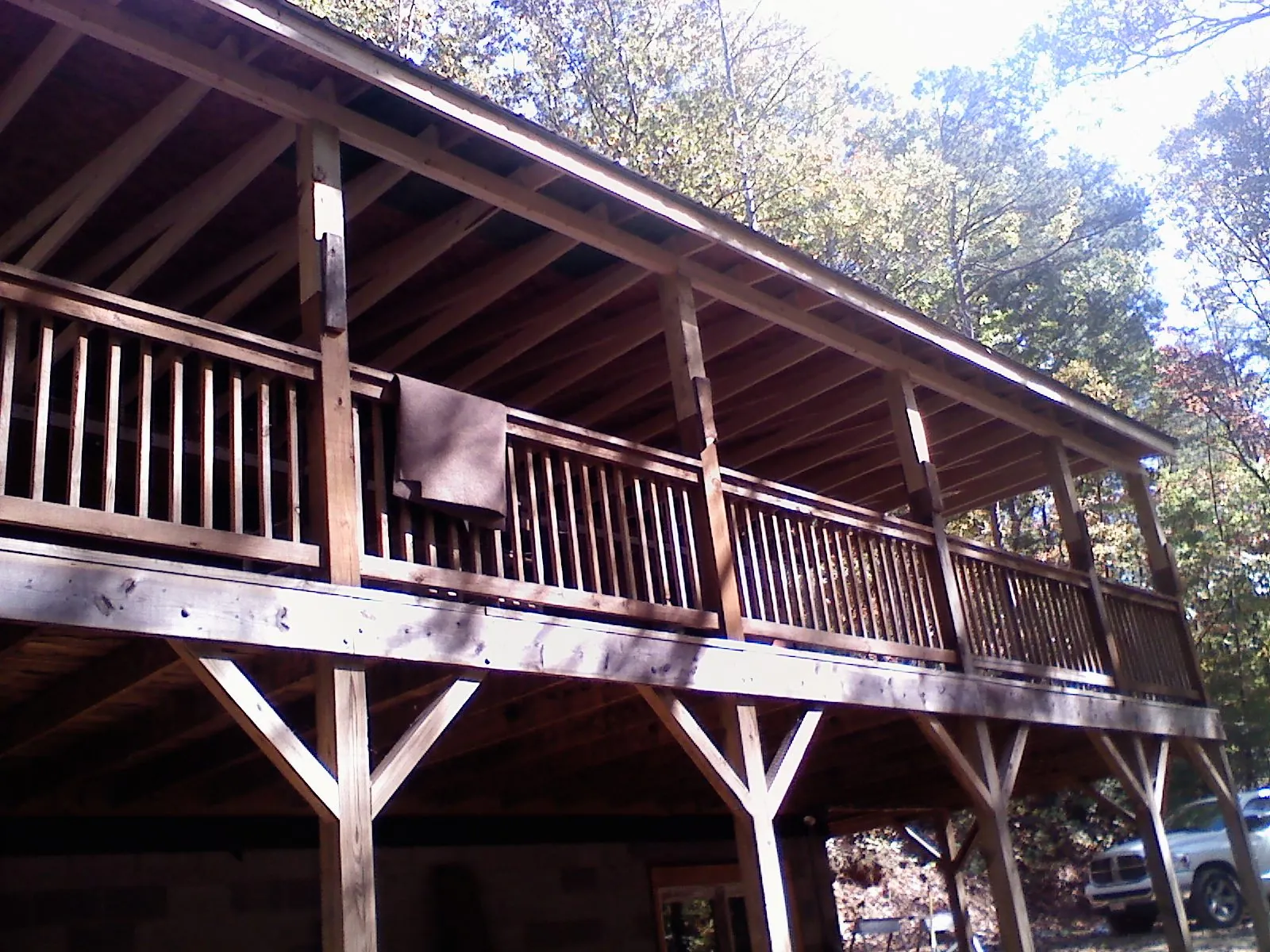 Timber framing under a new elevated porch and deck — Roof Leak Repair in Loyalhanna by Roofing Brothers